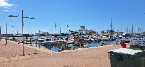 a bunch of boats docked in a harbor at Attico Morette, terrazzo - whazapp tre due 0 26 ott ott sei 2 quattro in Boissano