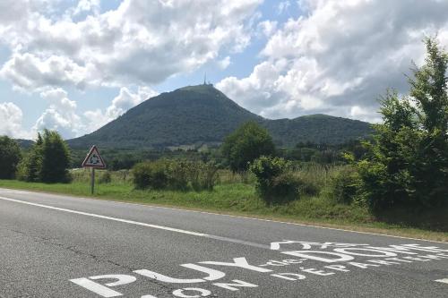 a stop sign on the side of a road at Gîte au Bray in Bellenaves