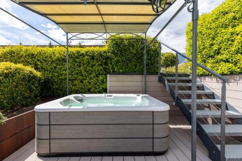 a hot tub on the roof of a house at Villa Vitali - Bellagio in Bellagio
