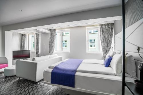 Postel nebo postele na pokoji v ubytování Magic Hotel & Apartments Kløverhuset