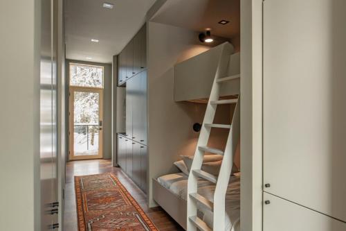a staircase in a room with a stair case at Idyll Reserve - Hocking Hills in South Bloomingville