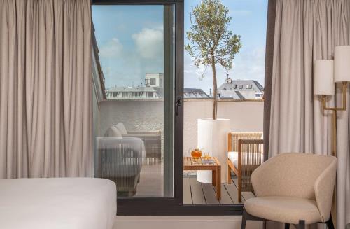 Posezení v ubytování Hôtel Arcanse by Inwood Hotels