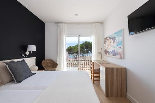 Hotel Terramarにあるベッド
