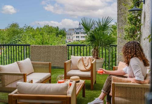 Χώρος καθιστικού στο Hôtel Arcanse by Inwood Hotels