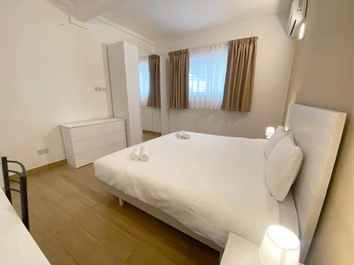 Letto o letti in una camera di Miami Apartments