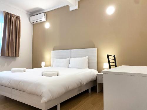 Letto o letti in una camera di Miami Apartments