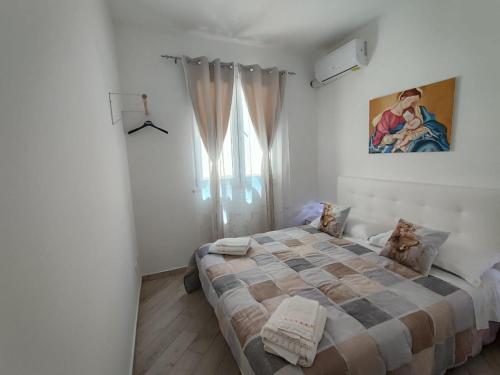 Voodi või voodid majutusasutuse Mediterranea Home toas