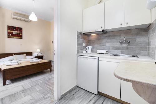 Η κουζίνα ή μικρή κουζίνα στο Tasoula Apartment with sea view 1