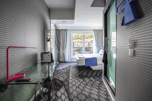 TV a/nebo společenská místnost v ubytování Magic Hotel & Apartments Kløverhuset