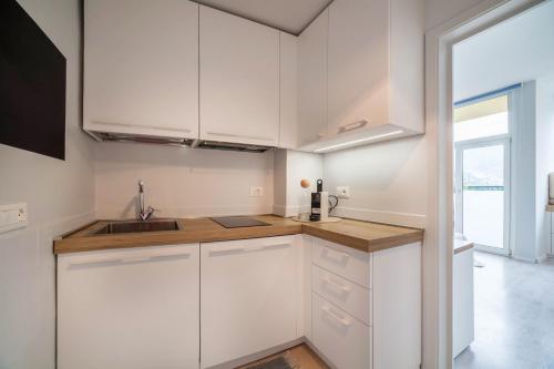 Kuchyň nebo kuchyňský kout v ubytování Nuvola 5th Floor