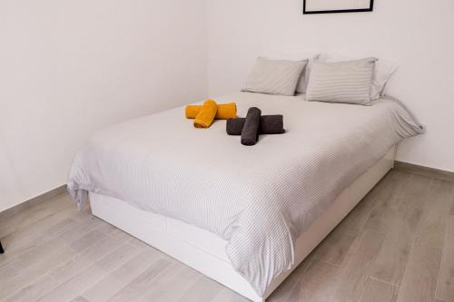 Ένα ή περισσότερα κρεβάτια σε δωμάτιο στο Casa Dos Borrachos