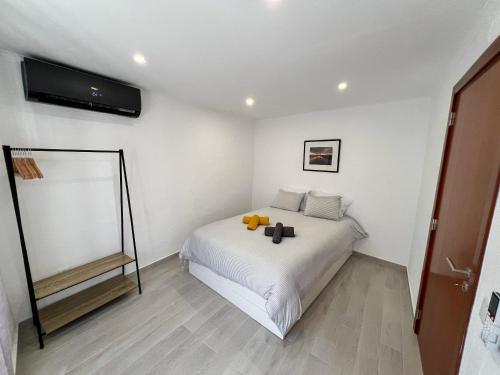 Ένα ή περισσότερα κρεβάτια σε δωμάτιο στο Casa Dos Borrachos