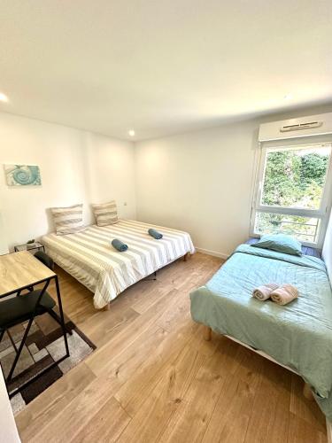 Photo de la galerie de l'établissement Grand T4 de 118m2 Proche Tram, Terrasse à seulement 25 mn des Plages, à Montpellier