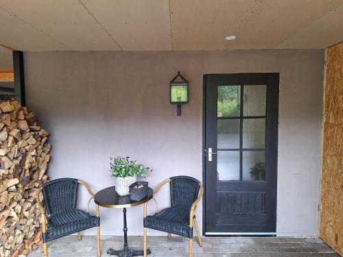 Ruang duduk di Loft De Hooizolder met Sauna bij te boeken