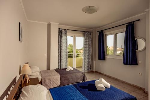 Postel nebo postele na pokoji v ubytování 2 bedrooms villa with private pool enclosed garden and wifi at Agrilia
