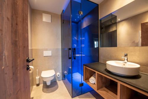 Ένα μπάνιο στο Filzsteinresort Wohnungen Top 4