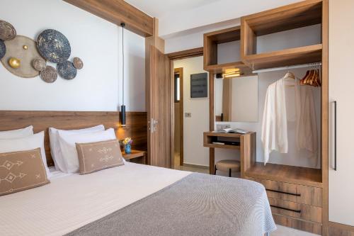 Ένα ή περισσότερα κρεβάτια σε δωμάτιο στο FYSIOPHYLIA VILLAS