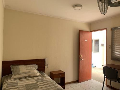 Postel nebo postele na pokoji v ubytování Homerent