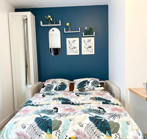 Postel nebo postele na pokoji v ubytování Cosy studio aux portes de Paris