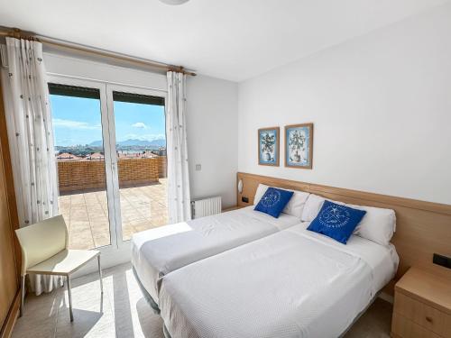 Ένα ή περισσότερα κρεβάτια σε δωμάτιο στο Apartamentos Solamaza
