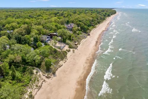 an aerial view of the shoreline of a beach at Nan's Escape in Union Pier