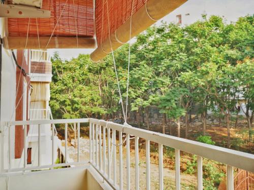 a view from the balcony of a house at Cityscape Comfort - Stylish 3BHK Central Getaway in Hyderabad