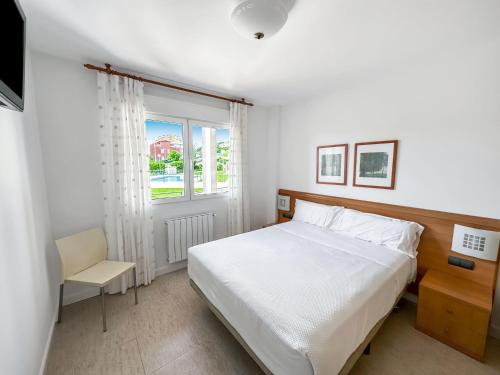 Ένα ή περισσότερα κρεβάτια σε δωμάτιο στο Apartamentos Solamaza