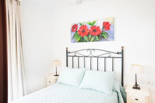 Postel nebo postele na pokoji v ubytování Precioso apartamento en primera línea en Torrox