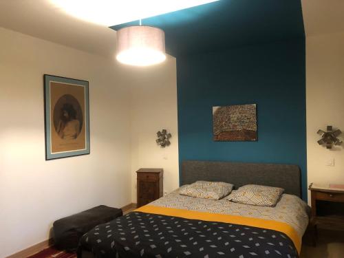Postel nebo postele na pokoji v ubytování Chambre sur une ile