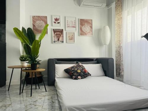 Posteľ alebo postele v izbe v ubytovaní Apartamento Torreón De La Huerta