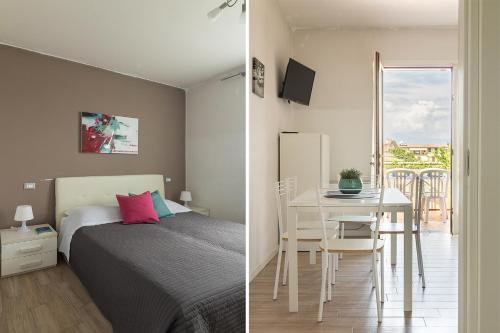 Un pat sau paturi într-o cameră la Attico Sirmione Easy