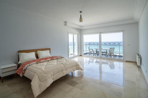 Postel nebo postele na pokoji v ubytování Novostar Apart Monte Carlo Sea View F71