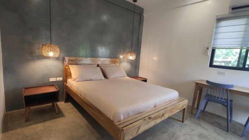 Postel nebo postele na pokoji v ubytování Nephthys homestay