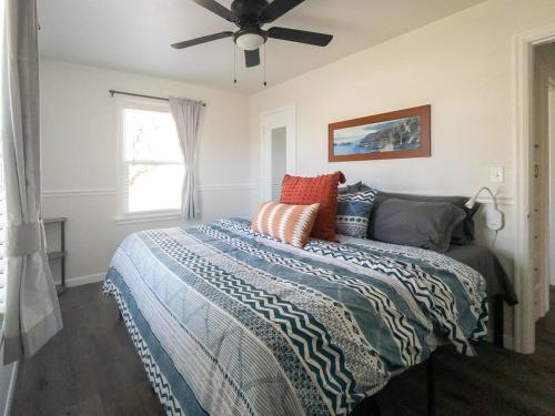 a bedroom with a bed and a ceiling fan at #StayInMyDistrict Walla Walla Wine Getaway in Walla Walla