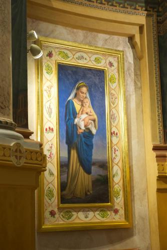 a painting of a woman holding a baby at Domus Australia in Rome