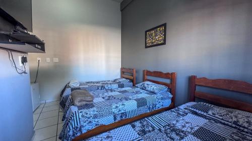 Katil atau katil-katil dalam bilik di Pling Hotel