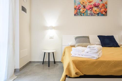 Postel nebo postele na pokoji v ubytování College Suites