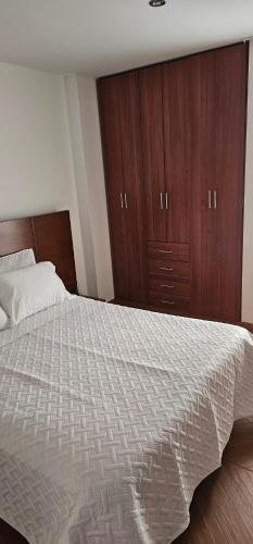 Postel nebo postele na pokoji v ubytování Villa Rosita