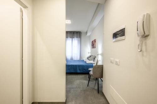 Postel nebo postele na pokoji v ubytování College Suites