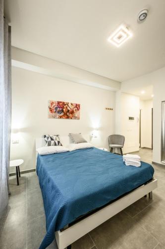 Postel nebo postele na pokoji v ubytování College Suites