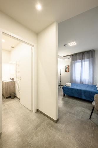 Postel nebo postele na pokoji v ubytování College Suites