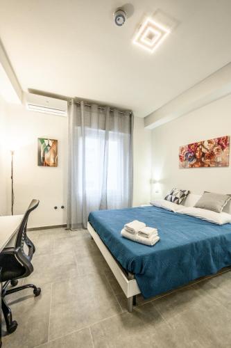 Postel nebo postele na pokoji v ubytování College Suites