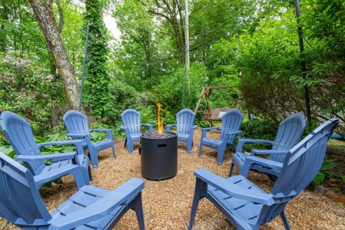 a group of blue chairs sitting around a table at Mills Gap Garden close to Asheville in Fletcher
