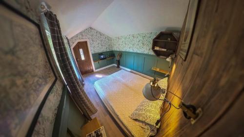 an overhead view of a room with a attic at Karklini glamping in Cēsis
