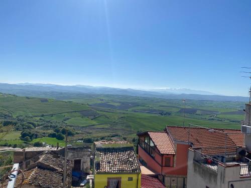 a view of a town with hills and buildings at Antico Borgo sul Mare in Petacciato