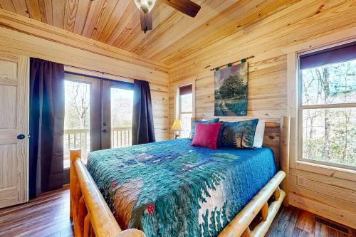 Ένα ή περισσότερα κρεβάτια σε δωμάτιο στο Mountain Memories