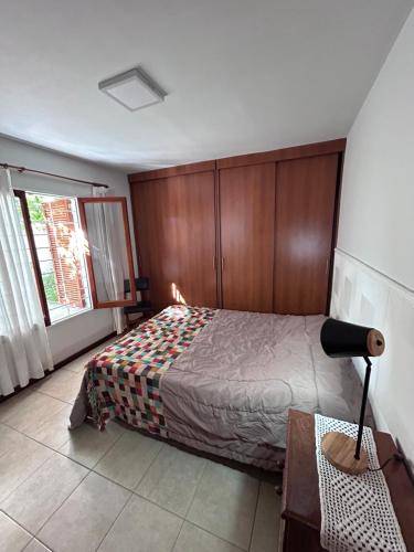 En eller flere senge i et værelse på Casa YO