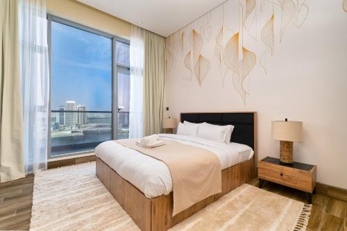 Katil atau katil-katil dalam bilik di GLOBALSTAY J One Tower Apartments at Pearl of UAE