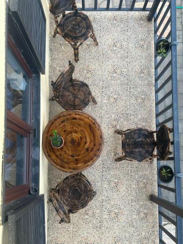 a group of wooden bowls on the side of a building at Aragvi Riverside in Aragvispiri