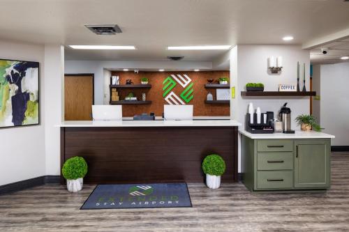 an office with a reception desk and a pharmacy at Extended Stay Airport in Green Bay